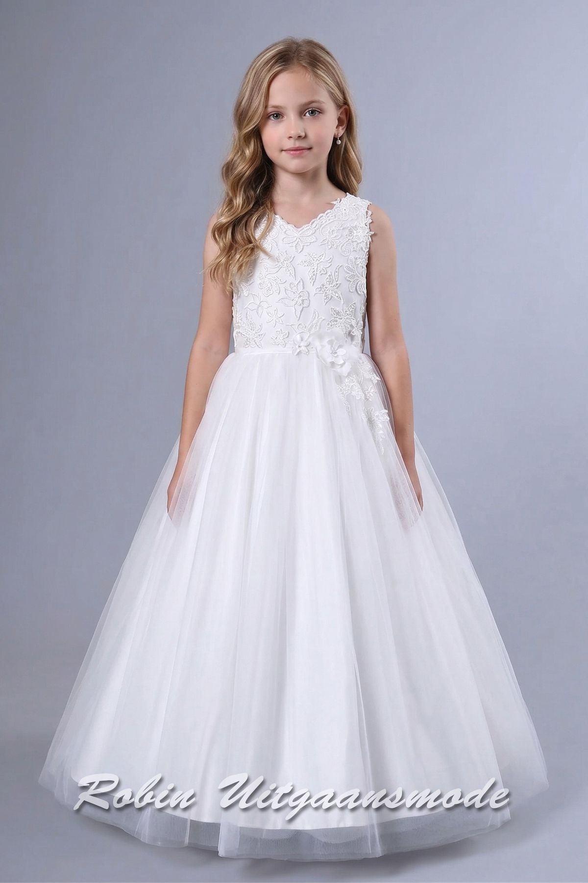 Bloemenmeisjesjurk met kanten lijfje, petticoat rok met tule toplaag en een grote strik op de rug
