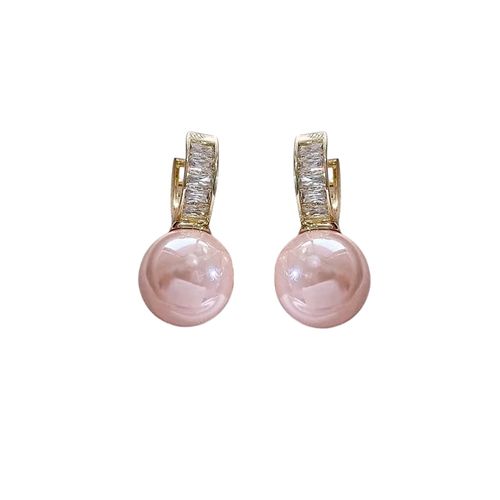 Roze parel oorbellen met goudkleurige sluiting