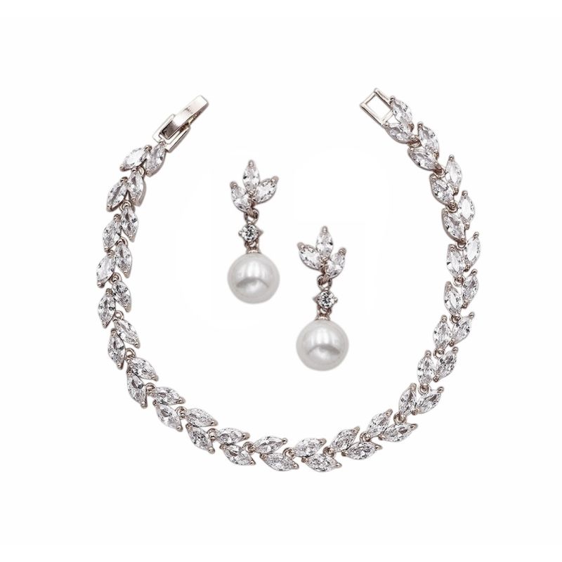 Zirkonia armband set met bijpassende parel oorbellen